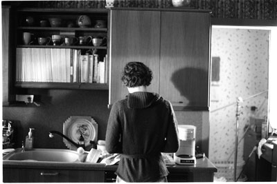 Nurit Monacelli does a few dishes since she's standing there anyway.