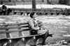 Katie (Nurit Monacelli) sits alone in central park.